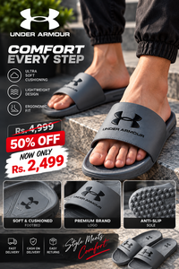 Man wearing grey Under Armour slides outdoors